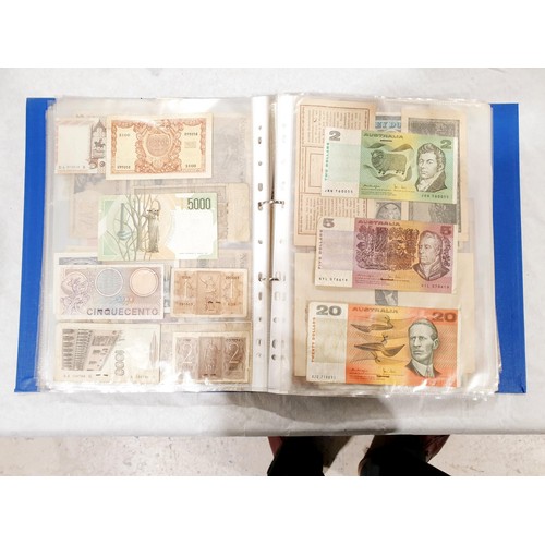 60 - A folder of world bank notes. UK shipping £14.