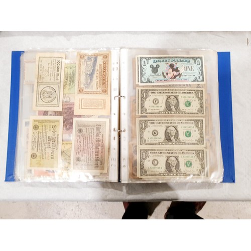 60 - A folder of world bank notes. UK shipping £14.