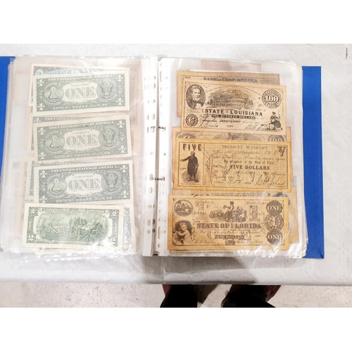 60 - A folder of world bank notes. UK shipping £14.