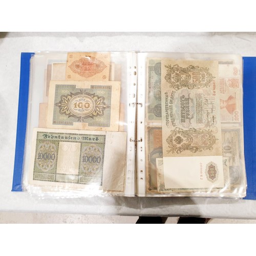 60 - A folder of world bank notes. UK shipping £14.