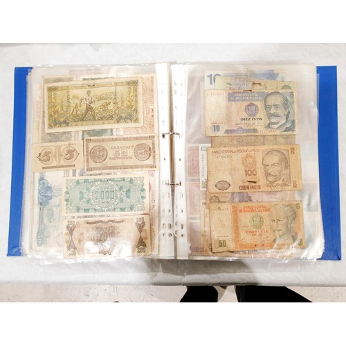 60 - A folder of world bank notes. UK shipping £14.