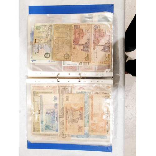 60 - A folder of world bank notes. UK shipping £14.