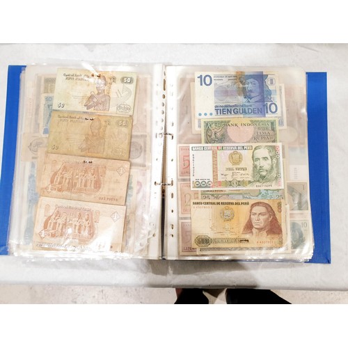 60 - A folder of world bank notes. UK shipping £14.