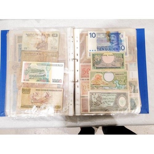 60 - A folder of world bank notes. UK shipping £14.