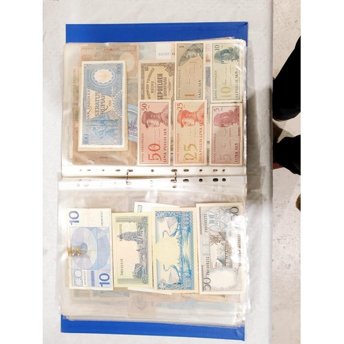 60 - A folder of world bank notes. UK shipping £14.