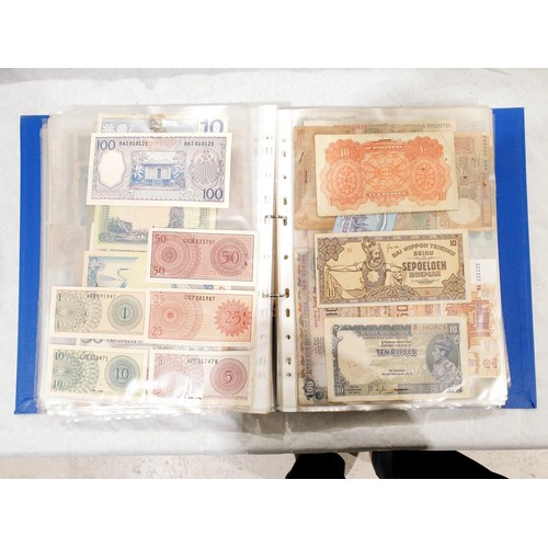 60 - A folder of world bank notes. UK shipping £14.