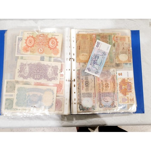 60 - A folder of world bank notes. UK shipping £14.