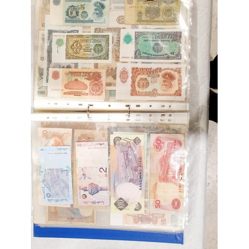 60 - A folder of world bank notes. UK shipping £14.