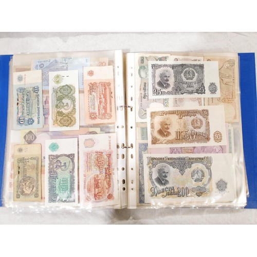 60 - A folder of world bank notes. UK shipping £14.