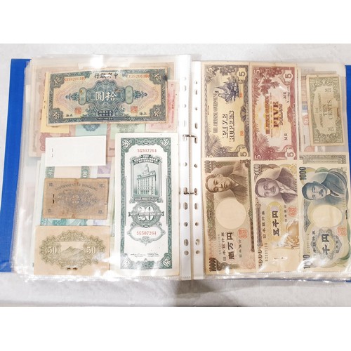 60 - A folder of world bank notes. UK shipping £14.