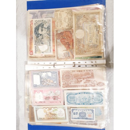 60 - A folder of world bank notes. UK shipping £14.