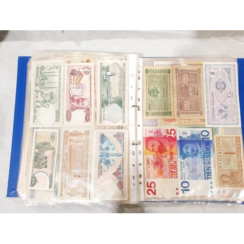 60 - A folder of world bank notes. UK shipping £14.