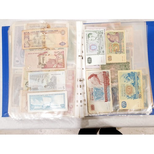 60 - A folder of world bank notes. UK shipping £14.