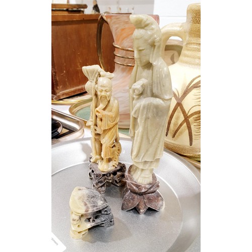 56 - Two Chinese soap stone carvings, the tallest 19.5cm together with a soap stone plinth. No shipping. ... 