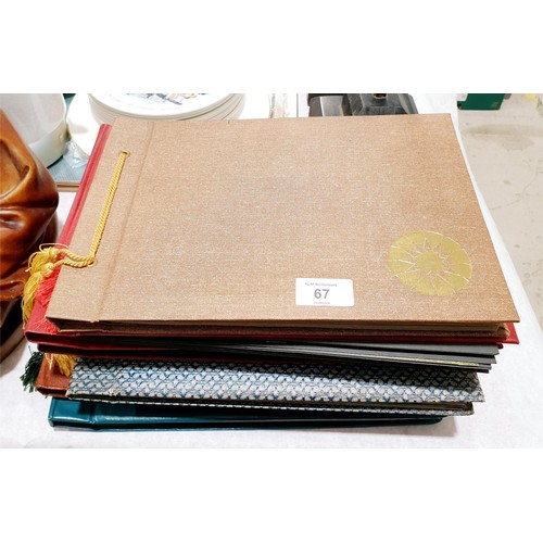 67 - Six postcard albums. UK shipping £14.