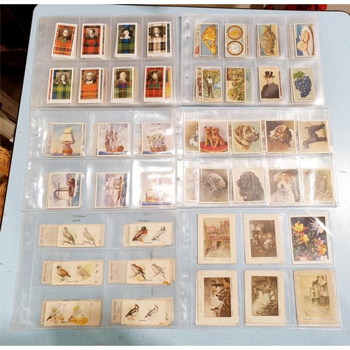 74 - Cigarette cards, 2000AD comics and assorted. UK shipping £14.