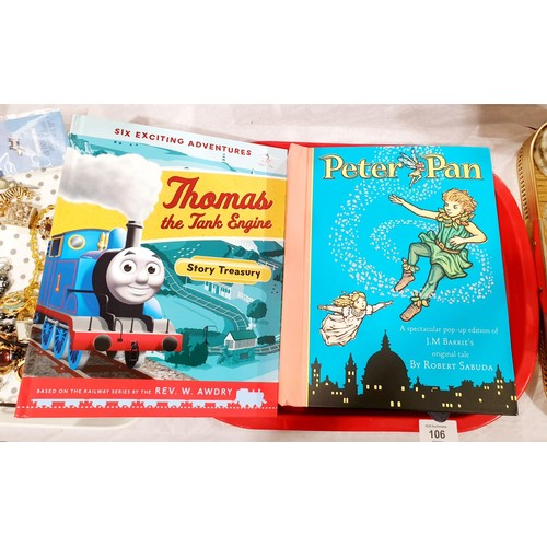 106 - A vintage Kit-Kat 50th anniversary tray, a Peter Pan pop-up book and a Thomas the Tank Engine book. ... 