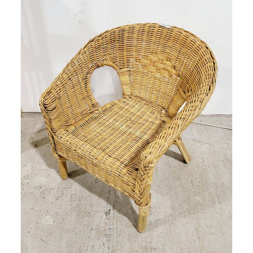 212 - A child's cane work tub armchair. No Shipping. Arrange collection or your own packer and shipper, pl... 