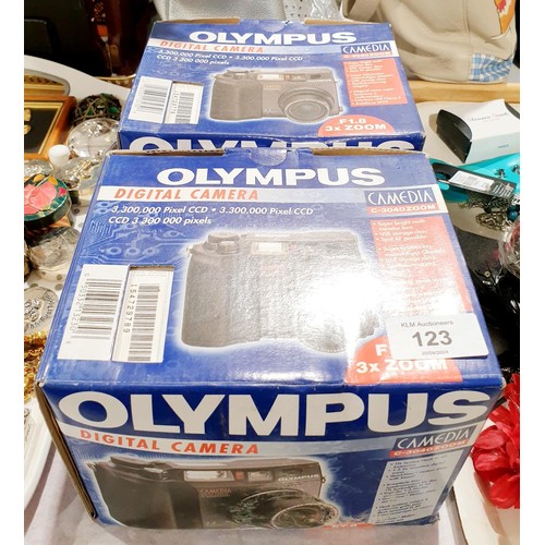 123 - Two new in box Olympus Camedia C-3040 cameras. UK shipping £14.