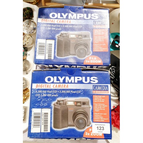 123 - Two new in box Olympus Camedia C-3040 cameras. UK shipping £14.