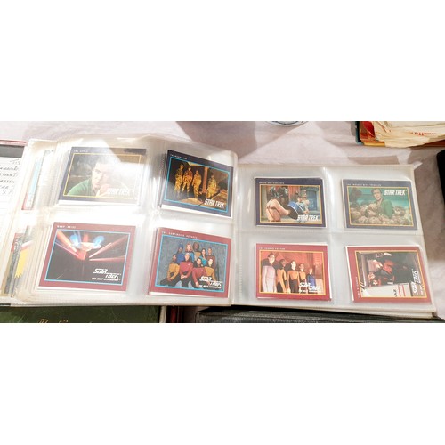 134 - A folder of TV and movie collector's cards including Star Trek. UK shipping £14.