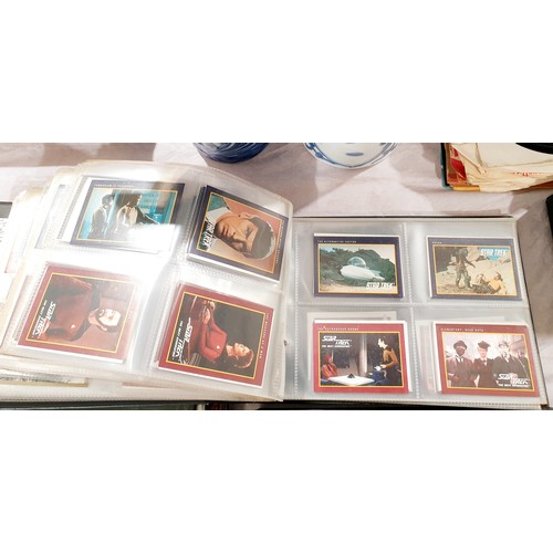 134 - A folder of TV and movie collector's cards including Star Trek. UK shipping £14.