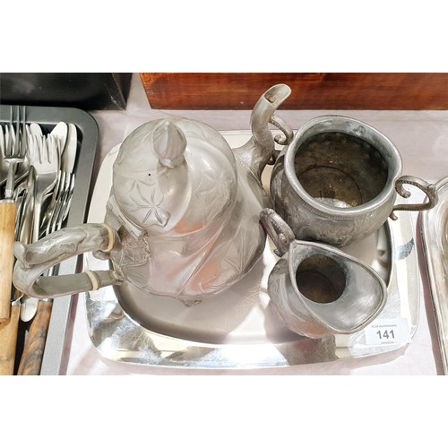 141 - An antique pewter three piece coffee set by James Dixon. UK shipping £14.