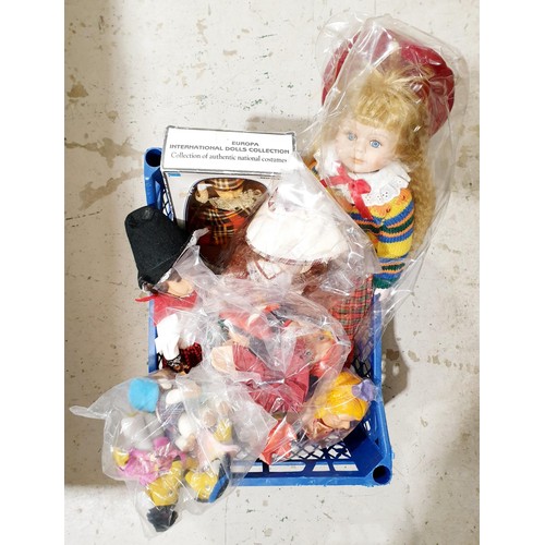 165 - A box of dolls, Punch and Judy puppets and other soft toys. No shipping. Arrange collection or your ... 