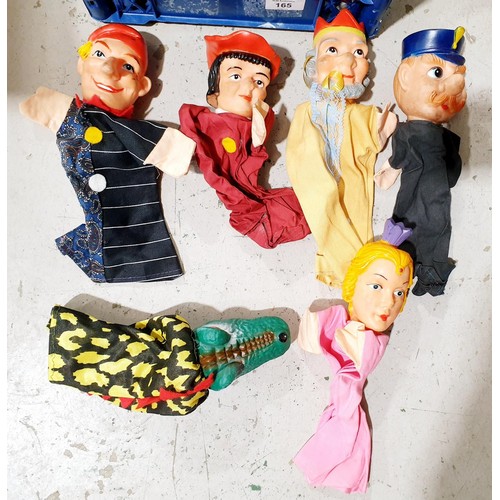 165 - A box of dolls, Punch and Judy puppets and other soft toys. No shipping. Arrange collection or your ... 