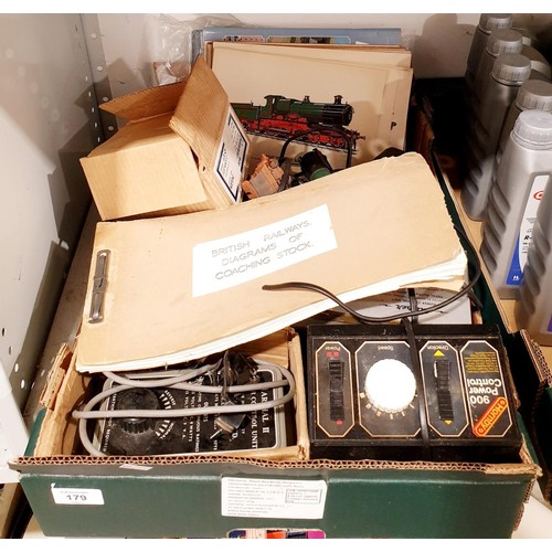 179 - A box containing model railway controllers, ephemera and a vintage British Railways diagrams of coac... 