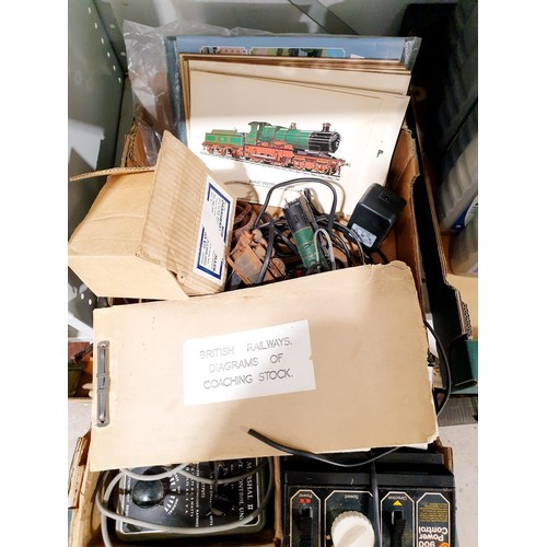 179 - A box containing model railway controllers, ephemera and a vintage British Railways diagrams of coac... 