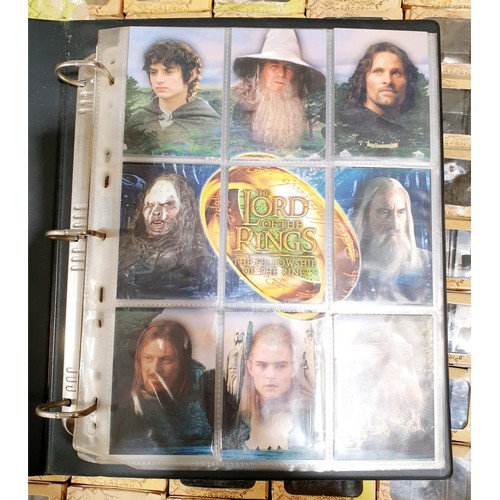 199 - A Topps Lord of the Rings trading card folder with a Fellowship of the Ring 72 card base set and The... 