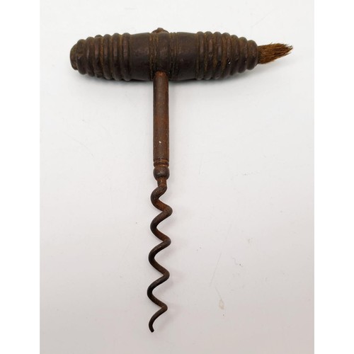 251 - An antique corkscrew, length 14.5cm. UK shipping £14.