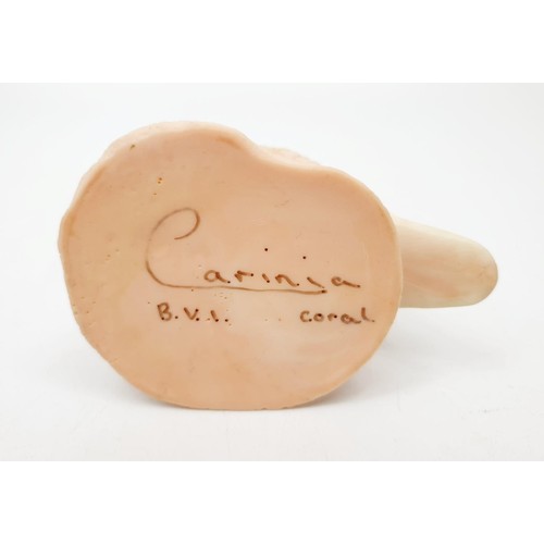 252 - A Carinia coral carving of a bird, height 10cm. No shipping. Arrange collection or your own packer a... 