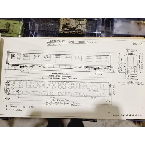 179 - A box containing model railway controllers, ephemera and a vintage British Railways diagrams of coac... 