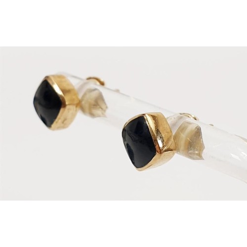 8 - A pair of hallmarked 9ct gold and Whitby jet earrings with box, gross weight 1.6g. UK shipping £14.