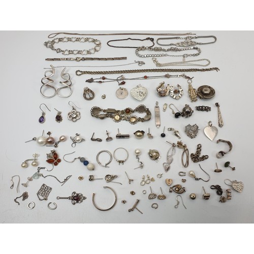 17 - A selection of scrap silver and white metal jewellery. UK shipping £14.