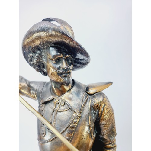 225 - An antique bronze effect spelter figure of a Cavalier, height 52cm. No shipping. Arrange collection ... 