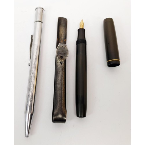 27 - A vintage Fleet pen with 14ct gold nib and pocket clip together with a four colour pencil. UK shippi... 