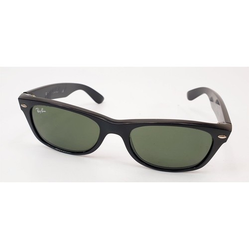 28 - A vintage pair of Ray Ban Wayfarer sunglasses. UK shipping £14.