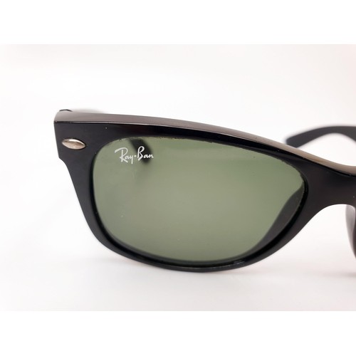 28 - A vintage pair of Ray Ban Wayfarer sunglasses. UK shipping £14.