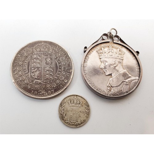 30 - An 1887 half crown, an 1893 three pence together with a silver 1937 Coronation coin in a silver pend... 