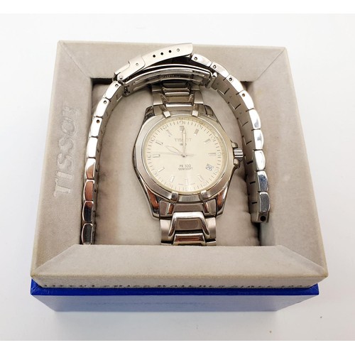 31 - A boxed Tissot PR100 gentleman's stainless steel quartz wrist watch with a spare strap. UK shipping ... 