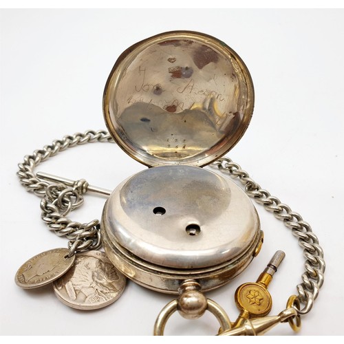 33 - A continental 800 silver cased pocket watch, A/F on a silver plated chain with coins. UK shipping £1... 