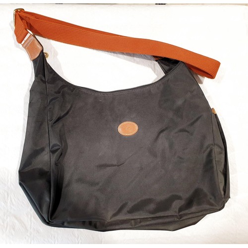 34 - Four Longchamp bags. UK shipping £14.