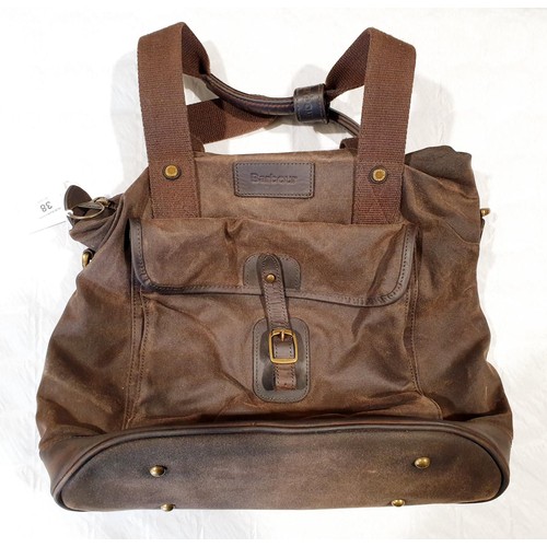 38 - A Barbour wax bag together with a Francesco Biasia bag. UK shipping £14.