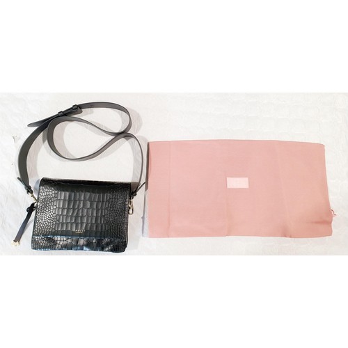 47 - A Radley handbag and two Radley purses. UK shipping £14.