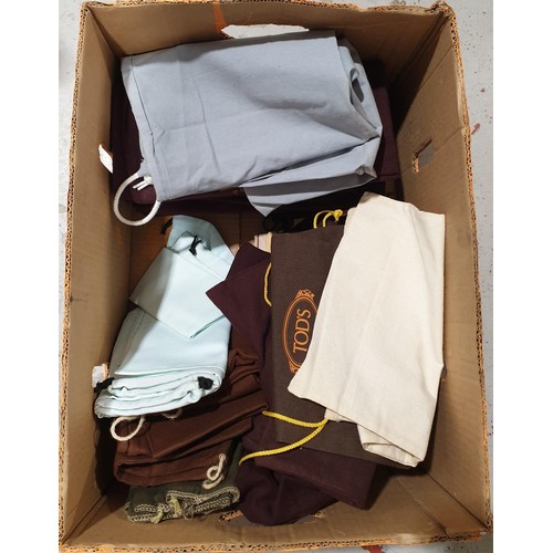 83 - A box of designer dust bags including Radley, Miu Miu and Mulberry. UK shipping £14.