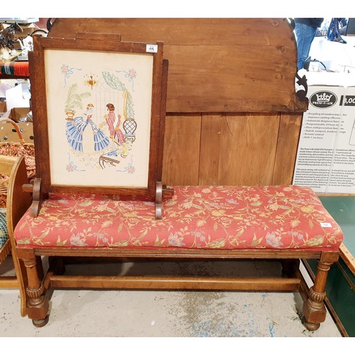 125 - A vintage oak upholstered bench, width 121cm together with an oak fire screen. No shipping. Arrange ... 