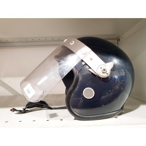 164 - A riot helmet, size 60-61cm. UK shipping £14.